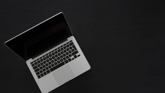 A sleek, modern office setup showcasing web design and SEO enhancement solutions in Naples, Florida